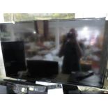 SAMSUNG 40 INCH LED TELEVISION WITH REMOTE AND MANUAL.