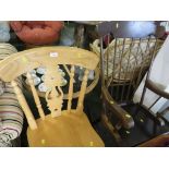 LIGHT WOOD SPINDLE BACK KITCHEN CHAIR AND A DARK WOOD FRAMED SPINDLE BACK ROCKING CHAIR.