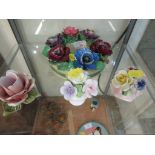 CERAMIC POSIES INCLUDING COALPORT AND BOOTHS, TOGETHER WITH A CHAMBER STICK IN THE FORM OF A ROSE.