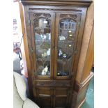 OLD CHARM OAK ILLUMINATED DISPLAY CABINET WITH LEADED GLAZED UPPER SECTION. (NEEDS ATTENTION)