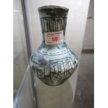 STUDIO POTTERY VASE DEPICTING FISH AND SAILING BOAT WITH STAMPED SIGNATURE AND MARK TO BASE.