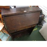 SMALL STAINED OAK BUREAU WITH SINGLE DRAWER AND OPEN SHELF BENEATH.