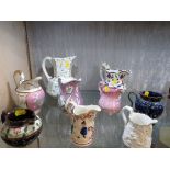 SELECTION OF MAINLY 19TH CENTURY POTTERY AND CERAMIC JUGS.