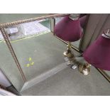 LARGE RECTANGULAR BEVEL EDGED MIRROR WITH A MIRRORED FRAME.