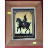 GLASS PAINTING OF MILITARY OFFICER ON HORSE BACK IN A MAPLE VENEER FRAME, LABELLED TO BACK BELVEDERE
