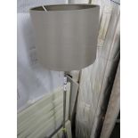STAINLESS FLOOR STANDING LAMP WITH SHADE.