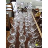 ASSORTED WINE GLASSES AND DRINKING VESSELS, CRUETS WITH SILVER-PLATED MOUNTS, CANDLE HOLDER AND