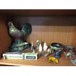 SHELF OF DECORATIVE ITEMS INCLUDING CAST METAL DOOR STOP , HAND BELL , FIGURINES , HAND PAINTED BOWL