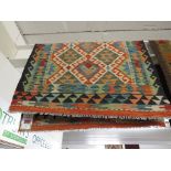 A SMALL CHOBI KILIM GEOMETRIC RUG 126 BY 79 CM .