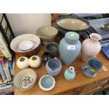 POTTERY ITEMS INCLUDING LIDDED URN STAMPED CAR, PLANTERS, AND VASES