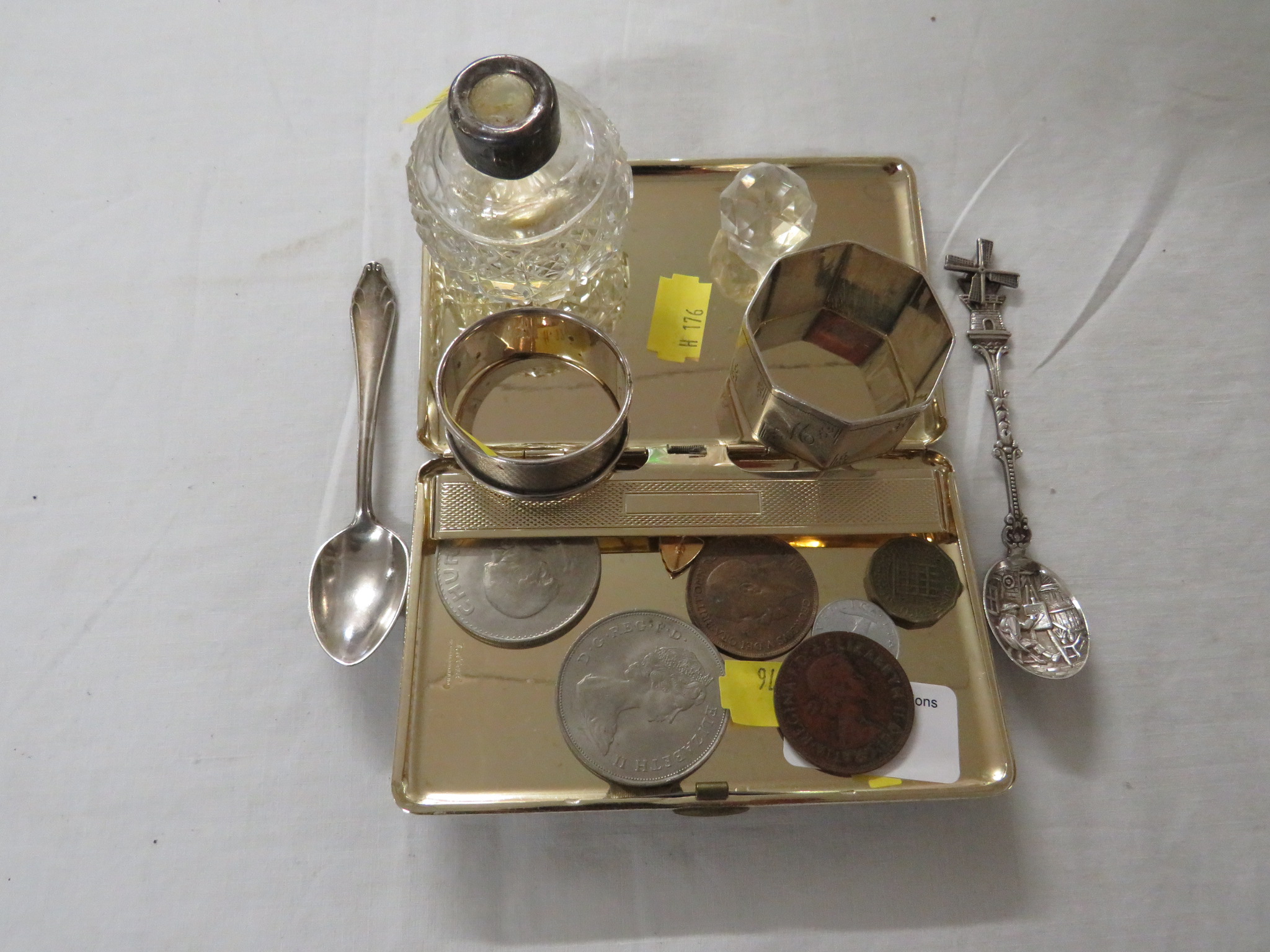 HALLMARKED SILVER NAPKIN RING 0.3 OZT, ONE OTHER STAMPED SILVER, TWO FOREIGN SILVER SPOONS. PLATED