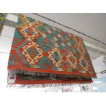 CHOBI KILIM ORANGE GROUND RUG 148 BY 100 CM .