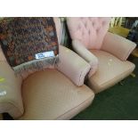 A PAIR OF HORSE HAIR STUFFED BUTTON BACK ARMCHAIRS IN LIGHT RED PATTERNED UPHOLSTERY, STANDING ON