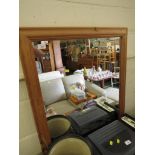 LARGE RECTANGULAR MIRROR IN A PINE FRAME.