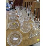 GLASS BOWLS AND DISHES DECORATED WITH FRUIT AND ASSORTED GLASS DRINKING VESSELS.