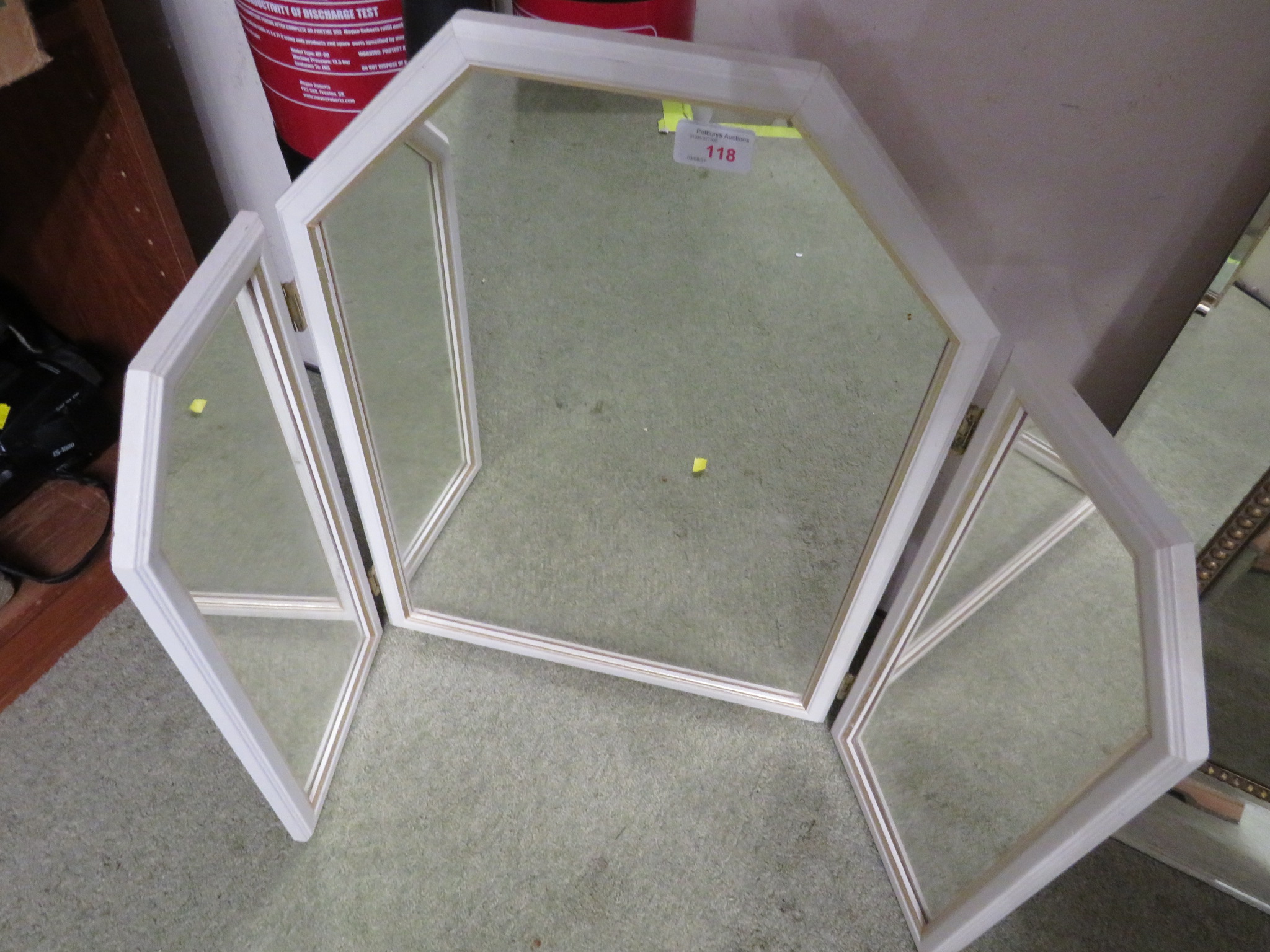 THREE PANEL DRESSING TABLE MIRROR IN A WHITE PAINTED FRAME.