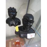 PAIR OF CARVED WOODEN AFRICAN STYLE BUSTS