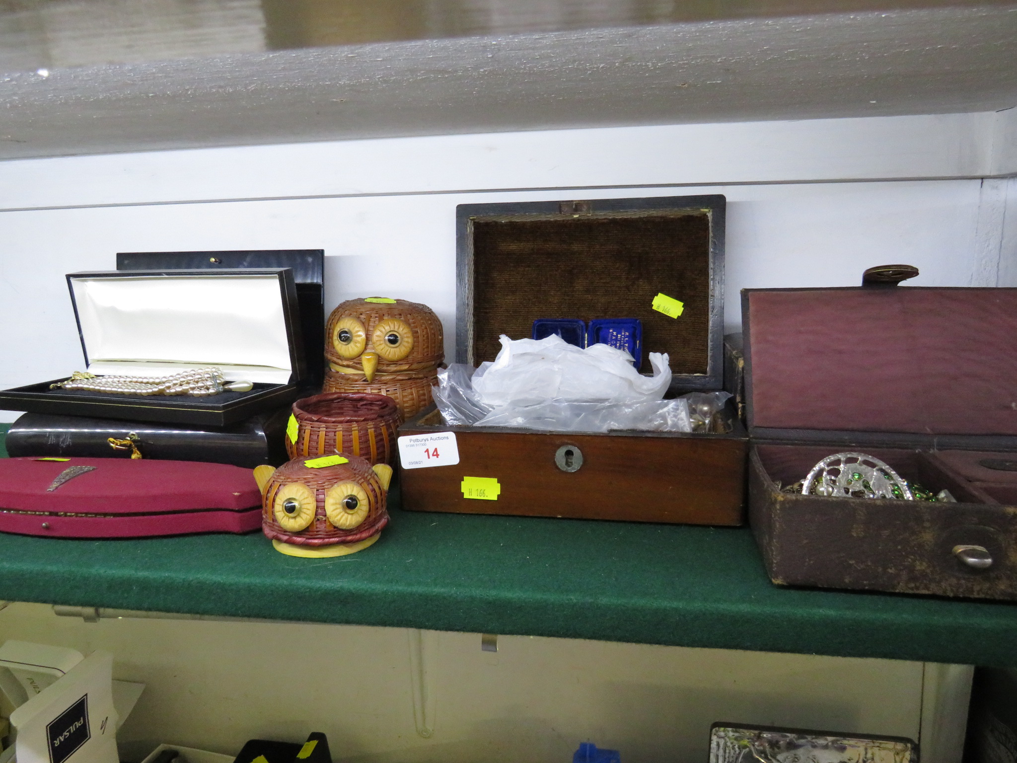 FOUR JEWELLERY CASES WITH CONTENTS OF MIXED COSTUME JEWELLERY, TWO WICKER OWLS WITH CONTENTS OF