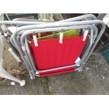 FOUR OUTDOOR FOLDABLE CHAIRS. (AF)