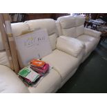 A PAIR OF MANUALLY RECLINING TWO-SEATER SOFAS IN PALE CREAM LEATHER EFFECT UPHOLSTERY