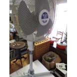 BLUE ICE ELECTRIC FAN ON STAND.