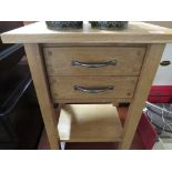 LIGHT OAK TWO-TIER SIDE TABLE WITH TWO DRAWERS.
