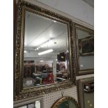 RECTANGULAR BEVEL EDGED WALL MIRROR.