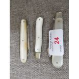 THREE SILVER AND MOTHER OF PEARL FRUIT KNIVES