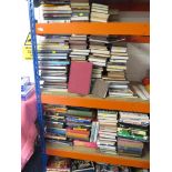 A LARGE SELECTION OF FICTION AND REFERENCE BOOKS THREE SHELVES.