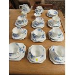COLCLOUGH CHINA TEA SERVICE DECORATED WITH BLUE FLOWERS.