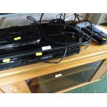 A HUMAX FREE SAT BOX AND A PANASONIC DVD RECORDER WITH INSTRUCTIONS AND REMOTE.