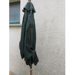 GREEN FABRIC GARDEN PARASOL WITH CAST METAL STAND