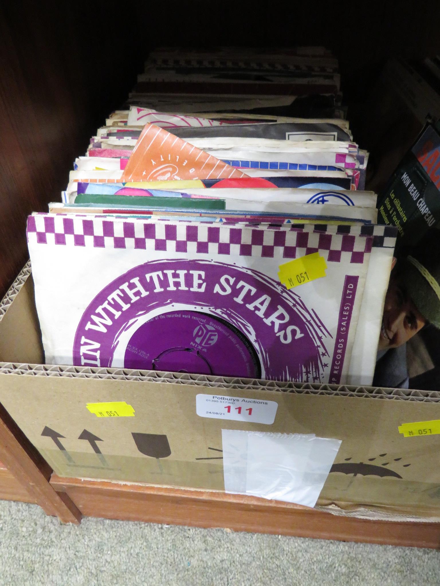 A BOX OF 45 RPM SINGLES