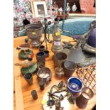 SELECTION OF METAL WARE INCLUDING CANDLE STICKS, DOOR STOPS AND SILVER-PLATED ITEMS.