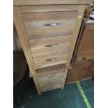 PAIR OF LIGHT OAK THREE DRAWER BEDSIDE CHESTS.