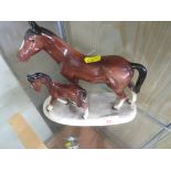 CERAMIC FIGURAL GROUP OF MARE AND FOAL WITH MARK TO BASE.