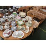 CIRCULAR PINE KITCHEN TABLE TOGETHER WITH THREE MATCHED CHAIRS*