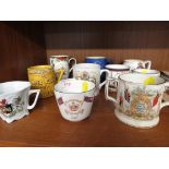 SELECTION OF ROYAL COMMEMORATIVE CHINA CUPS AND MUGS TOGETHER WITH A MILITARY CRESTED TWO HANDLED