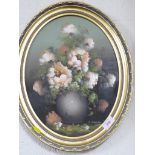 FRAMED OIL ON BOARD STILL LIFE OF FLOWERS IN A GILT FRAME.