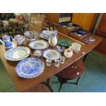 A SCANDART FURNITURE TEAK EXTENDING DINING TABLE TOGETHER WITH A SET OF FOUR CHAIRS WITH UPHOLSTERED