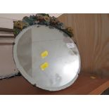 CIRCULER BEVELLED TABLE MIRROR WITH PAINTED FLORAL MOULDING.