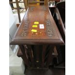 HARDWOOD MAGAZINE TABLE WITH BRASS INLAY.