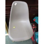 MOULDED PLASTIC CHAIR WITH LIGHT WOOD LEGS. *