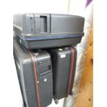 THREE HARD PLASTIC TRAVEL CASES. *