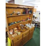 COMPOSITE PINE DRESSER WITH TWO SHELVES TO TOP AND THREE DRAWERS OVER THREE CUPBOARD DOORS TO BASE.