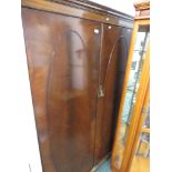 MAHOGANY VENEERED TWO DOOR WARDROBE. *