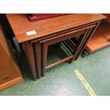 A NEST OF THREE MAHOGANY OCCASIONAL TABLES. *