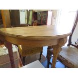 A PINE DEMI-LUNE HALL TABLE.