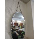 OVAL BEVEL EDGED FRAMELESS MIRROR.