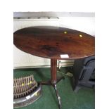 OVAL MAHOGANY TILT TOP SIDE TABLE WITH COLUMN SUPPORT AND TRIPOD LEGS.